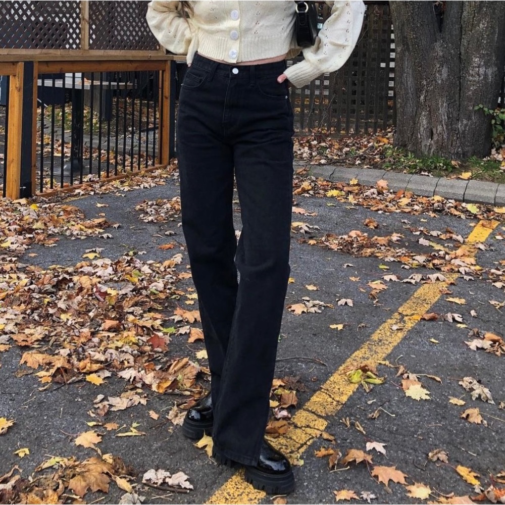 Black high waisted jeans with ankle slit